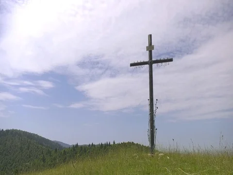 Christ cross on hill in mountain with clouds and sky Stock Footage 78382224