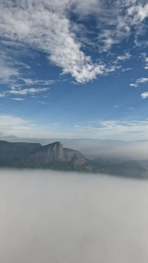 Christ the Redeemer Emerging Above Clouds, Rio de Janeiro Aerial Stock Footage 344477794