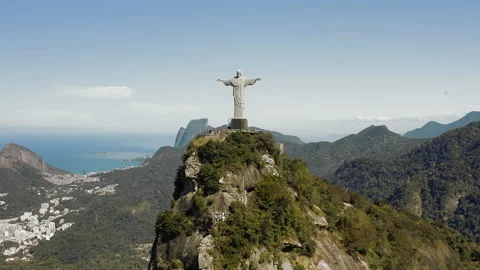 Christ the Redeemer Statue on the top of Corcovado Hill aerial panorama in Stock Footage 160465629