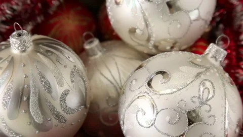 Christass decorations white balls on rotating table close-up. Stock Footage 75298069