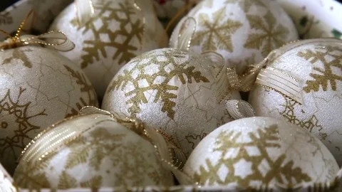 Christass decorations white painted balls on rotating table close-up. Stock Footage 75298067