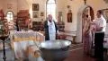 Christening of little baby in orthodox church (infant baptism) HD Footage