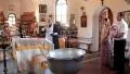 Christening of little baby in orthodox church (infant baptism) HD Footage