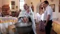 Christening of little baby in orthodox church (infant baptism) HD Footage