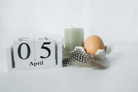 Christian Catholic Easter 2026 date on a wooden calendar with Easter egg, c.. Stock Photos