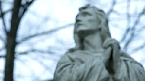 Christian Cemetery Praying Statue Pull Focus 01 HQ Видео 70070096