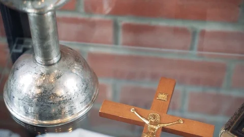 Christian cross and Scriptures lie on the glass.  Stock Footage 118395535