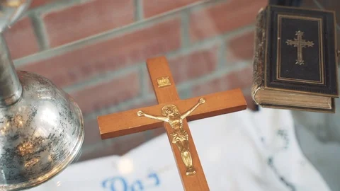 Christian cross and Scriptures lie on the glass. Stock Footage 118395550