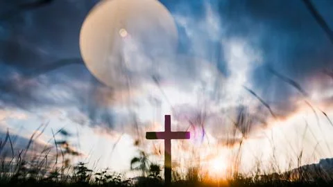 Christian cross standing at sunset with dramatic sky and lens flare Stock Illustration