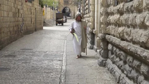 Christian pilgrim walking in jerusalem Stock Footage 145867046