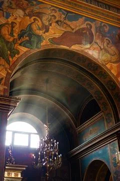 Christian temple with artwork and light shining through the windows during .. Stock Photos