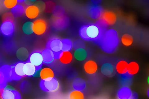 Christmas abstract blurred background. Multi-colored lights. Unfocused image Stockfoto's