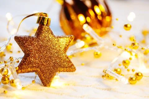 Christmas and New Year decorations star on lights background Stock Photos