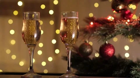 Christmas and New Year holidays, toast champagne. Glasses on background of Video stock 166318063