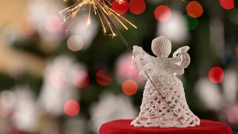 Christmas angel holding sparkler - loopable cinemagraph style video Video stock 81229050