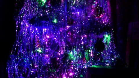 Christmas artificial tree decorated Stockbeeldmateriaal 129714439