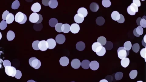 Christmas background backdrop bokeh lights sparkling on red Stock Footage 250385699