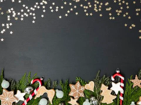 Christmas background on black background with different red christmas items Stock Photos