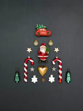Christmas background on black background with different red christmas items Foto stock