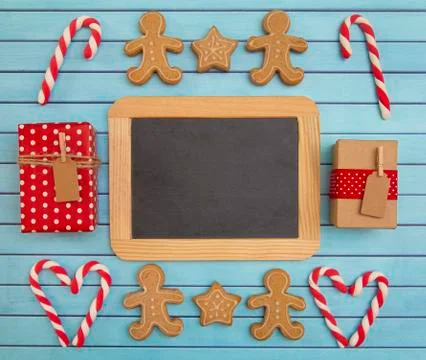 A Christmas Background with a Blank Chalkboard for Adding Text Stock Photos