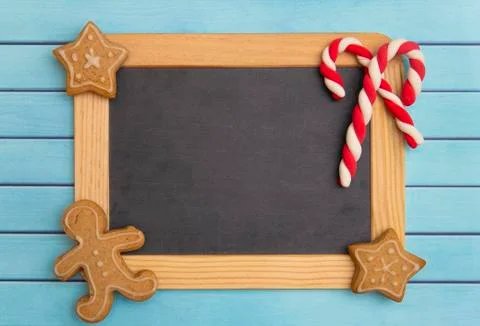 A Christmas Background with a Blank Chalkboard for Adding Text Stock Photos