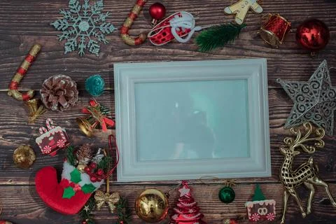 Christmas background blank frame for text with decorations on dark wooden b.. Stock Photos