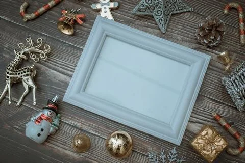 Christmas background blank frame for text with decorations on dark wooden b.. Stock Photos