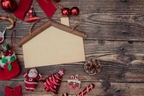 Christmas background blank frame for text with decorations on dark wooden b.. Stock Photos