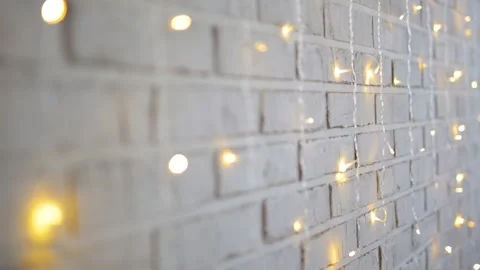 Christmas background - brick wall with lights and sparkle Stock Footage 185929545