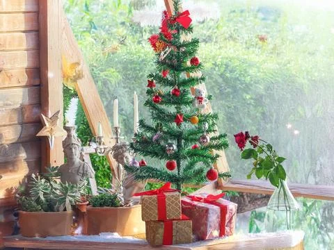 Christmas background with Christmas tree and Santa hat Photos