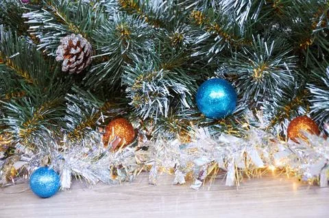 Christmas background with Christmas tree branches, blue and yellow layers a.. Photos