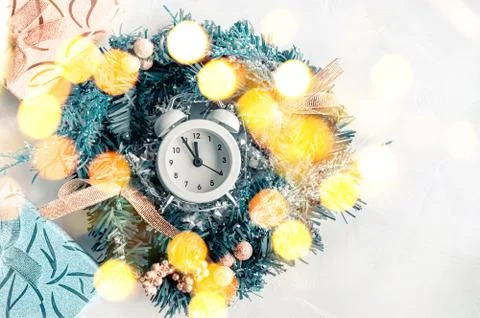 Christmas background with clock on light background. New year at midnight-old Stock Photos