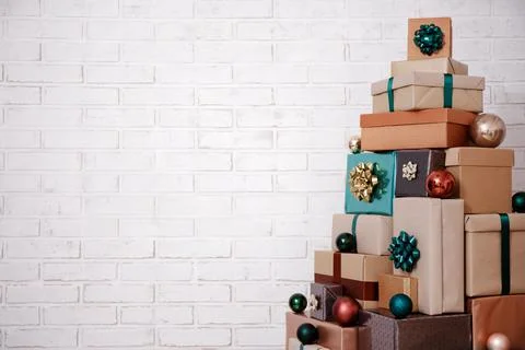 Christmas background - close up of gift boxes laid out in the shape of a Chri Foto stock