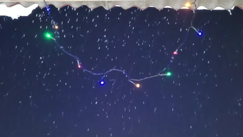 Christmas background. Falling snow and lights Video stock 228906368