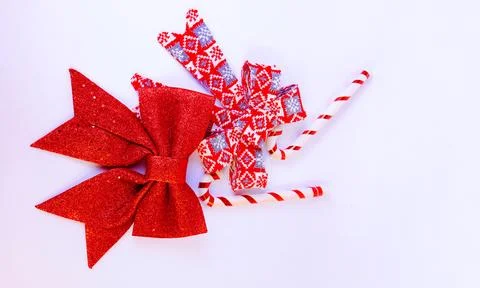 Christmas background featuring a red glitter bow Stock Photos
