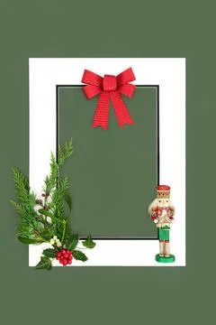 Christmas Background Frame with Nutcracker Flora and Red Bow Stock Photos
