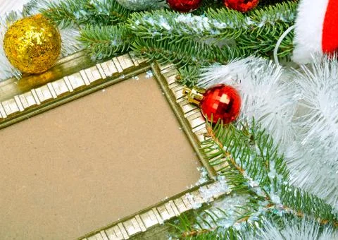 Christmas background. Frame, twig pine with serpentine. Stock Photos