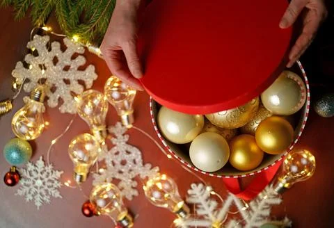 Christmas background with gift box open by woman hands, Preparation for holid Stock Photos
