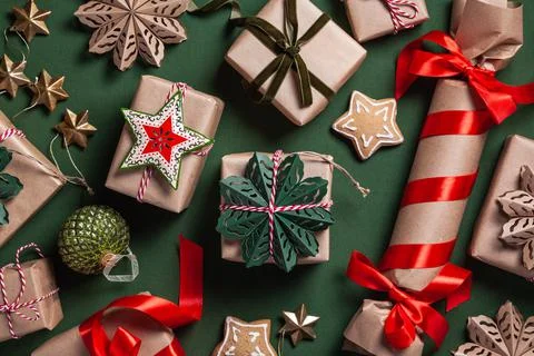 Christmas background with gift boxes, clews of rope and decorations. Stock Photos