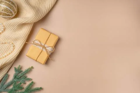 Christmas background with gift boxes, clews of rope, paper's rools and decora Stock Photos