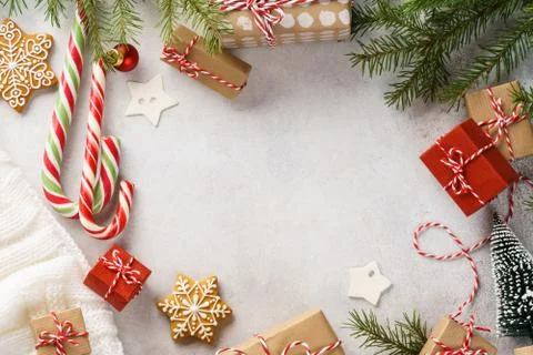 Christmas background with gift boxes, sweets and decoration. Stockfoto's