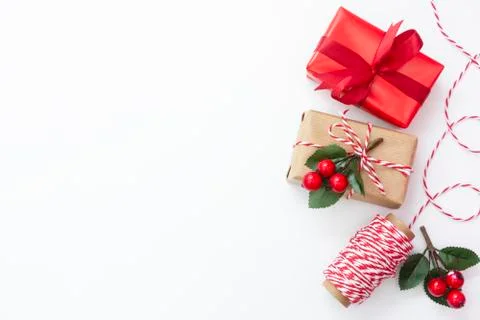 Christmas background. Gift boxes wraped in craft paper over white background. Foto stock