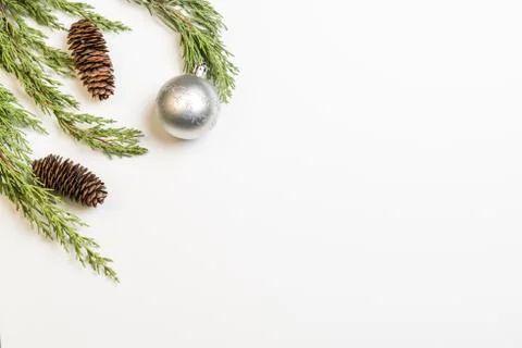 Christmas background made with pine branches, pine cones and Christmas decora Stock Photos