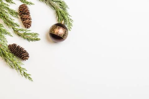 Christmas background made with pine branches, pine cones and Christmas decora Stock Photos