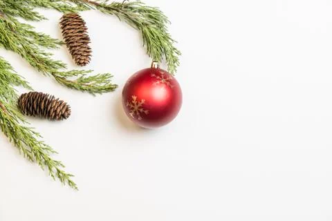 Christmas background made with pine branches, pine cones and Christmas decora Stock Photos