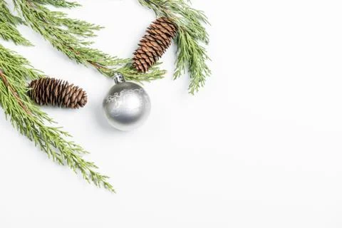Christmas background made with pine branches, pine cones and Christmas decora Stock Photos
