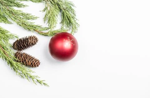 Christmas background made with pine branches, pine cones and Christmas decora Stock Photos