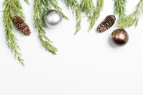Christmas background made with pine branches, pine cones and Christmas decora Stock Photos