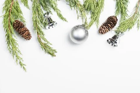 Christmas background made with pine branches, pine cones and Christmas decora Stock Photos