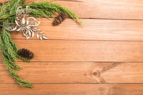 Christmas background made with pine branches, pine cones and Christmas decora Stock Photos